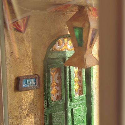 فانوس رمضان بداخله مشهد من شارع مصري فى رمضان 