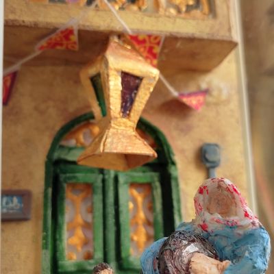 فانوس رمضان بداخله مشهد من شارع مصري فى رمضان 