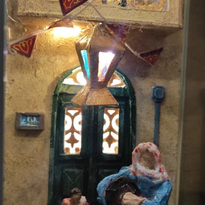 فانوس رمضان بداخله مشهد من شارع مصري فى رمضان 