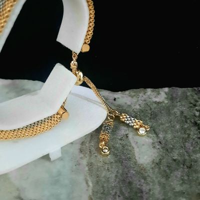 الأسورة الفضى بأطراف ذهبى من خرز الميوكى