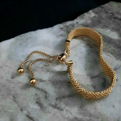 A gold-colored bracelet by Miyuki beads