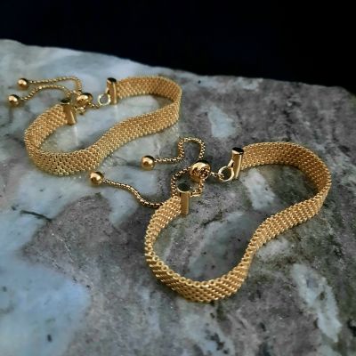 A gold-colored bracelet by Miyuki beads