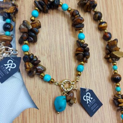  طقم كوليه واسوره وحلق من احجار التايجر والفيروز