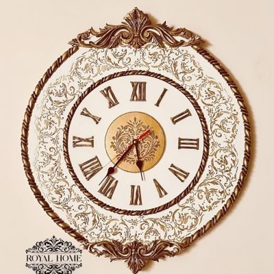 ساعة حائط خشبية