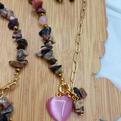 A set including a necklace, earrings, and a bracelet, made from broken agate stones