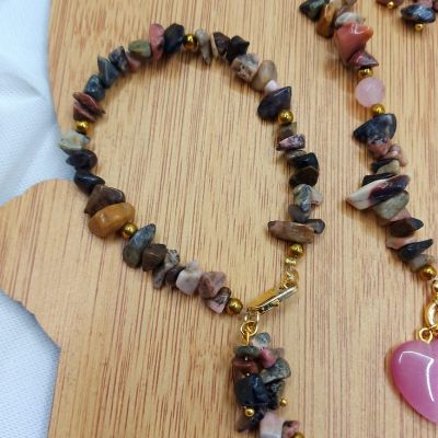 A set including a necklace, earrings, and a bracelet, made from broken agate stones