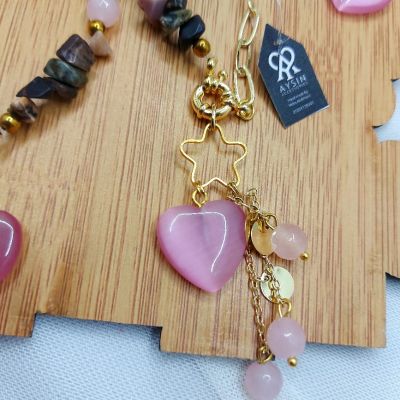 A set including a necklace, earrings, and a bracelet, made from broken agate stones