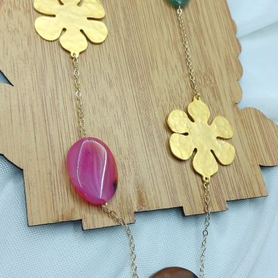 A necklace made of agate stones and gold-plated copper.
