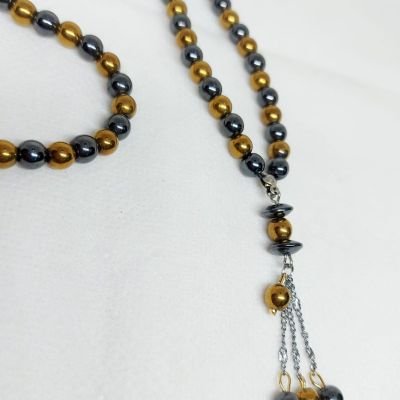 A 99-bead prayer necklace made from hematite stones.