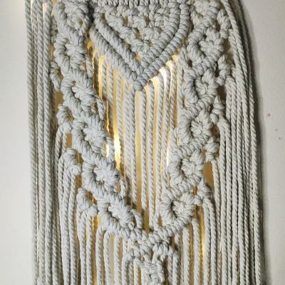 Wooden crescent moon with macrame work