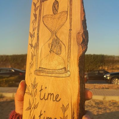 Butterfly in an Hourglass - جذع شجر زيتون
