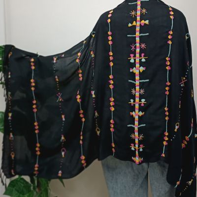 Hand embroidered cotton shawl by talanted Siwa oasis women, and hand woven loom in Nagada village.