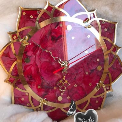 ساعة ريزن علي شكل وردة
