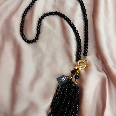 A necklace made of pearl stones.