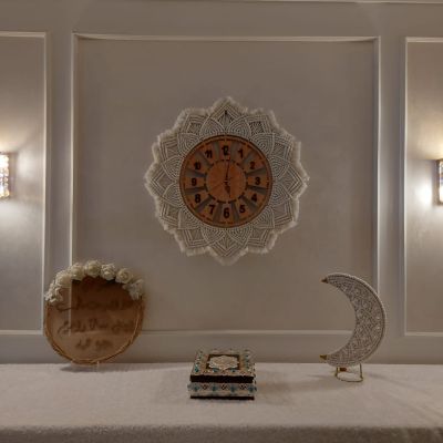 ساعة حائط مكرمية