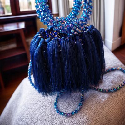 شنطه دائريه بالشراشيب 