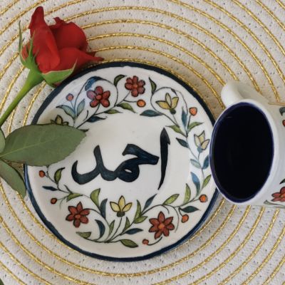 coffee cup and plate decorated with name 