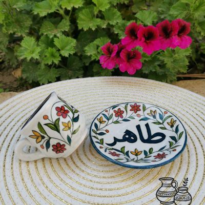 coffee cup and plate decorated with name 