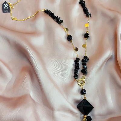 A Chinese gold-plated necklace made with agate stones and hematite spacers.