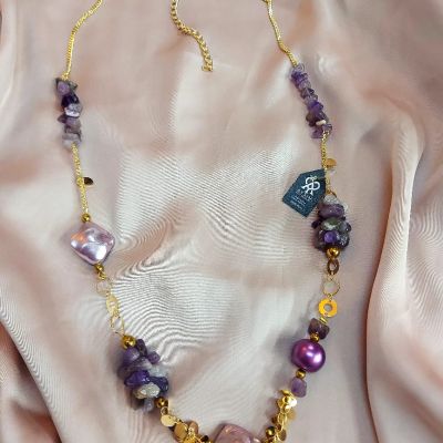 The necklace is made of amethyst stones.