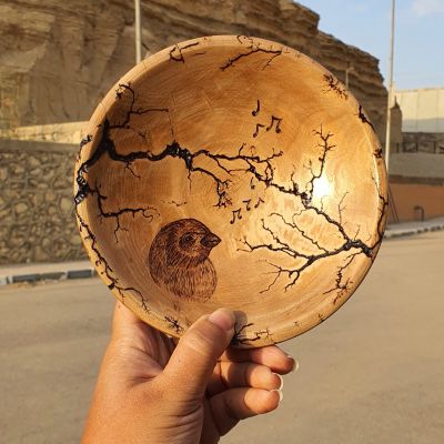 طبق جداري من خشب الزيتون