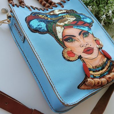 شنطة حريمى جلد طبيعي 