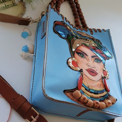 شنطة حريمى جلد طبيعي 