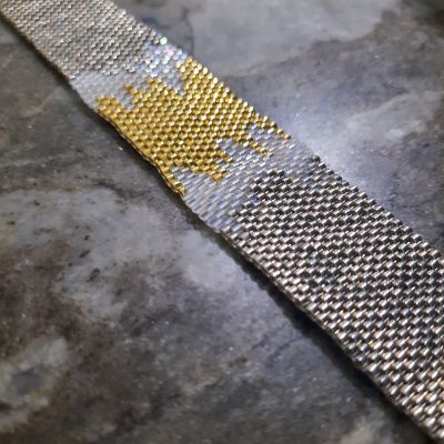 إسورة متداخلة الألوان الفضى والذهبى من خرز الميوكى