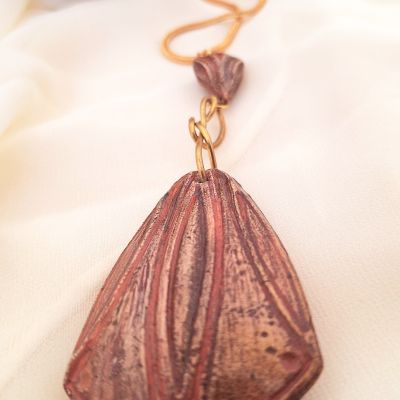 عقد خزف * نحاس