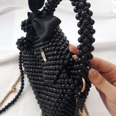 شنطة خرز اسمر بفيونكة