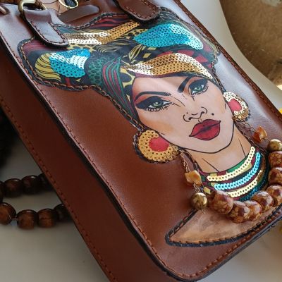 شنطة حريمى جلد طبيعي 