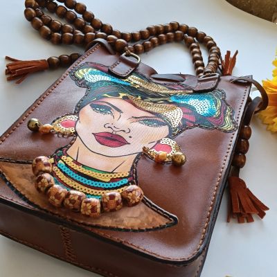 شنطة حريمى جلد طبيعي 