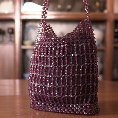 شنطة كريستال باذنجانى