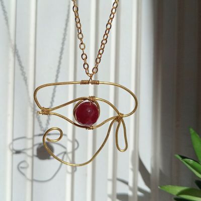 سلسلة نحاس علي شكل عين حورس 