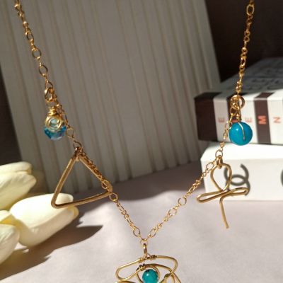 سلسلة نحاس بدلايات فرعونيه 