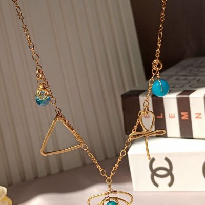 سلسلة نحاس بدلايات فرعونيه 