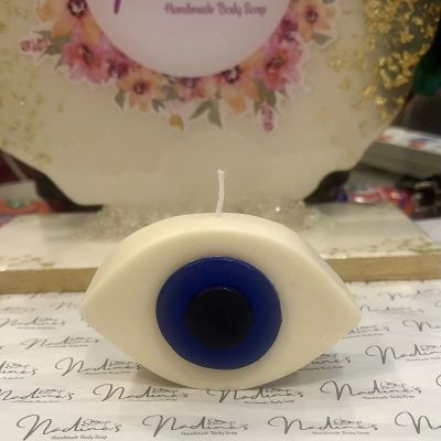 شمعة على شكل عين أزرق و أسود