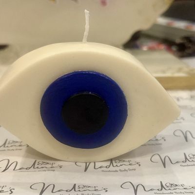 شمعة على شكل عين أزرق و أسود