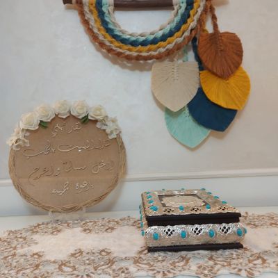 معلقة ريش  مكرمية 