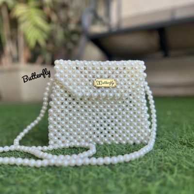 شنطه لولى ابيض 