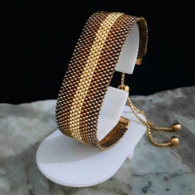 إسورة بدرجات البنى والعسلى من خرز الميوكى