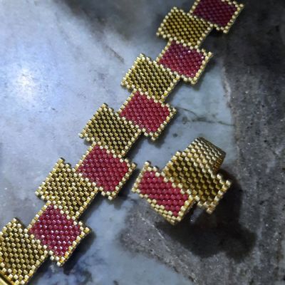 A set of honey and dark red rectangular Miyuki beads
