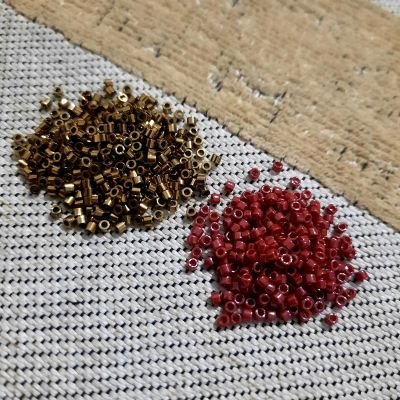 A set of honey and dark red rectangular Miyuki beads