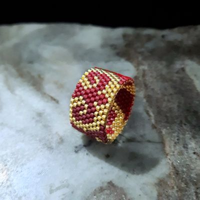 A dark red, Arabic-style set of Miyuki beads