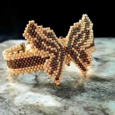 إسورة الفراشة باللون الشانجاه من خرز الميوكى