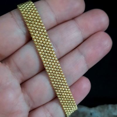 إسورة ذهبى من خرز الميوكى