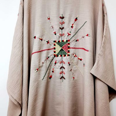 Hand-embroidered ponsho from Siwa