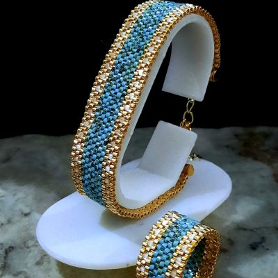 طقم فيروزى مع خرز الميوكى الكريستالى البراق من خرز الميوكى