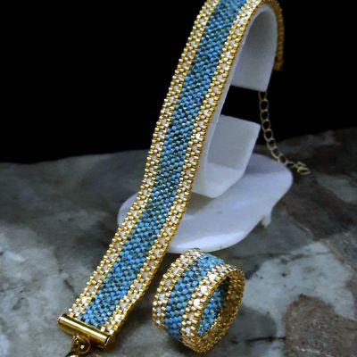 طقم فيروزى مع خرز الميوكى الكريستالى البراق من خرز الميوكى