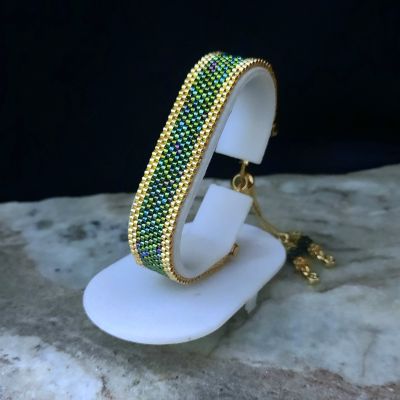 طقم بتصميم ورق الشجر باللون الاخضر من خرز الميوكى